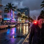 Rainy night on Ocean Drive with neon lights